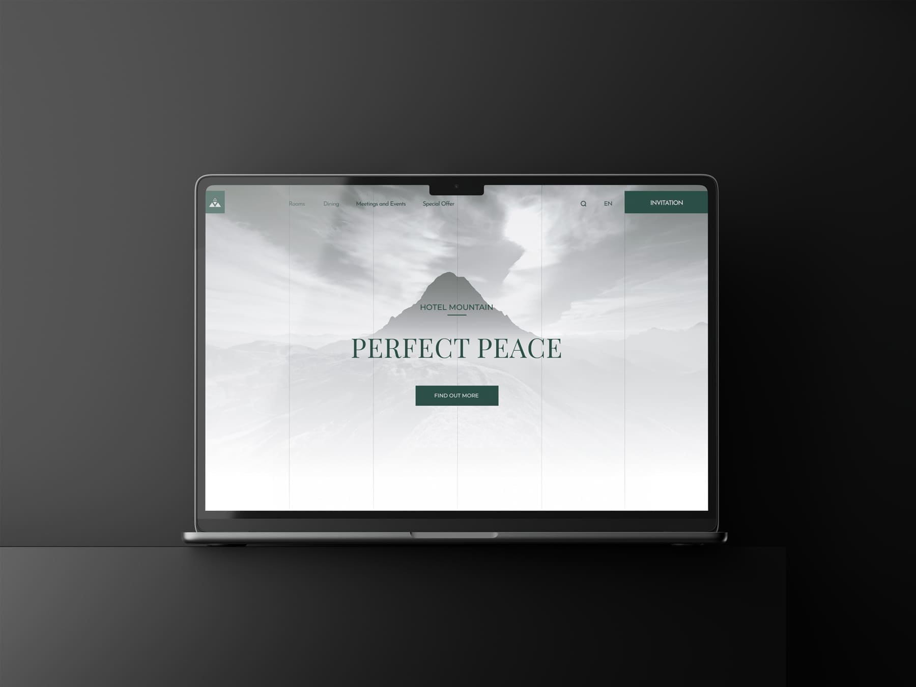 Hotel Mountain homepage hero section displayed on laptop screen